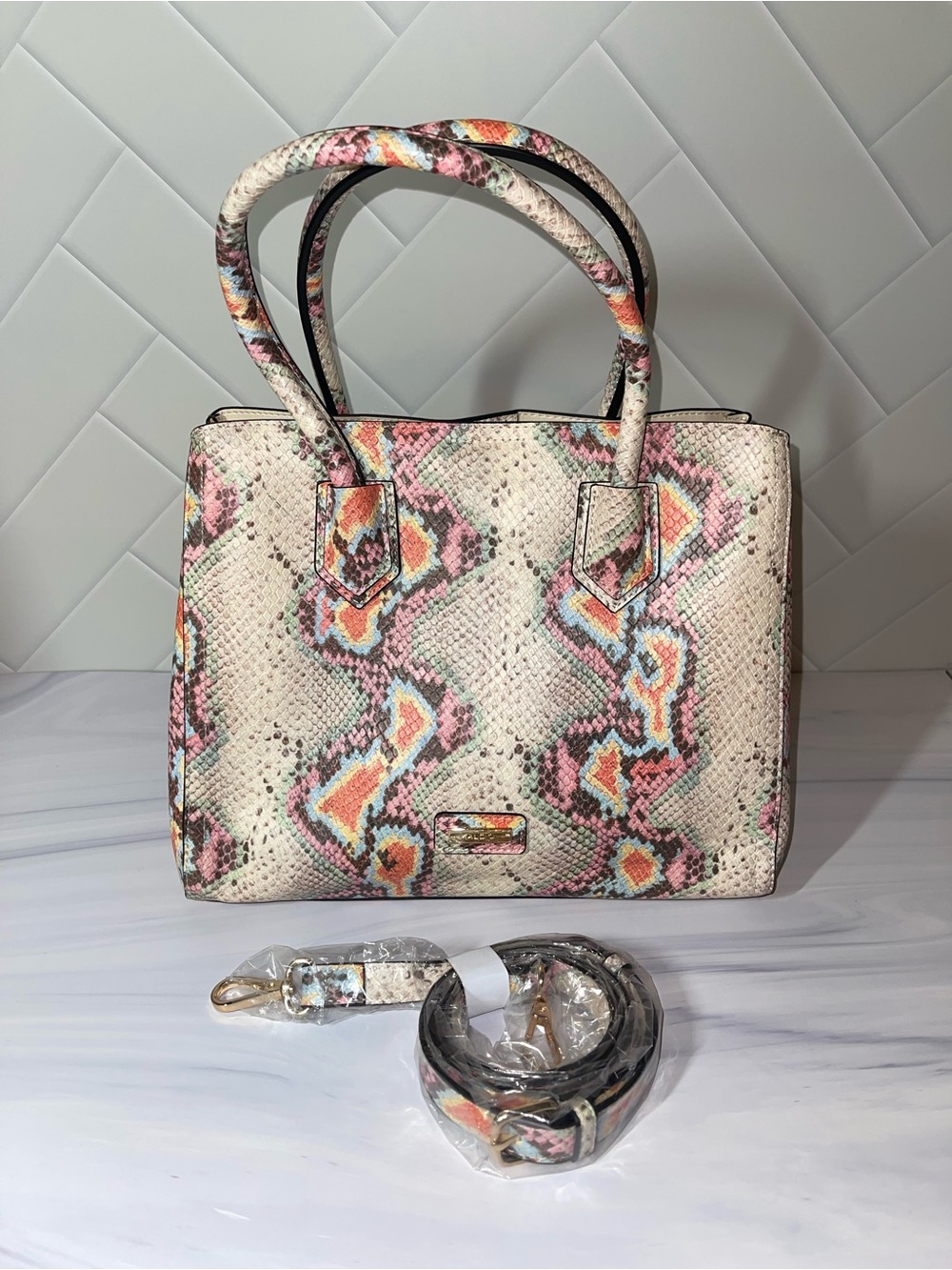 ALDO snakeskin purple/cream satchel with long shoulder strap. Like new!